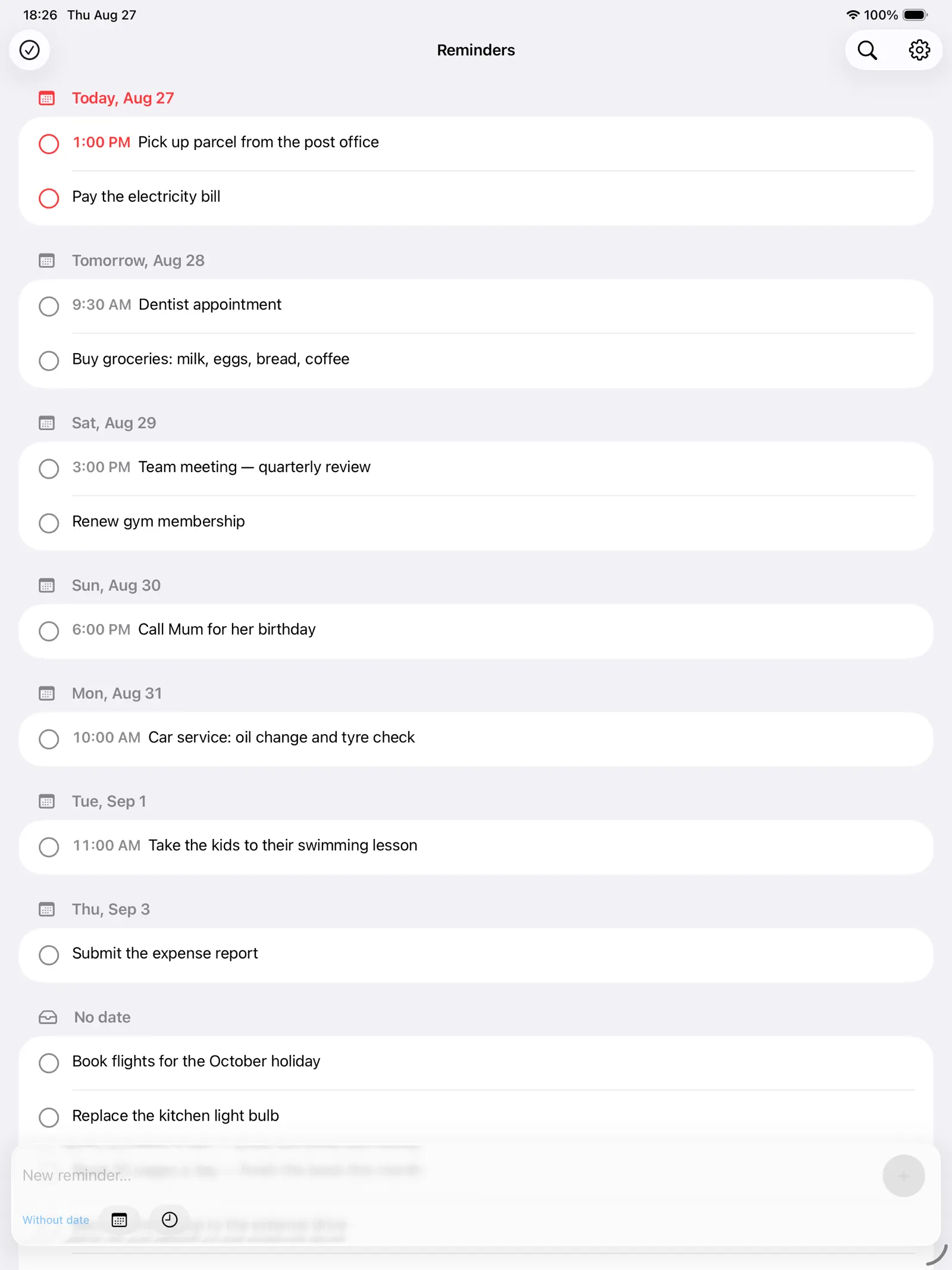 Reminders grouped by day on iPad, overdue in red